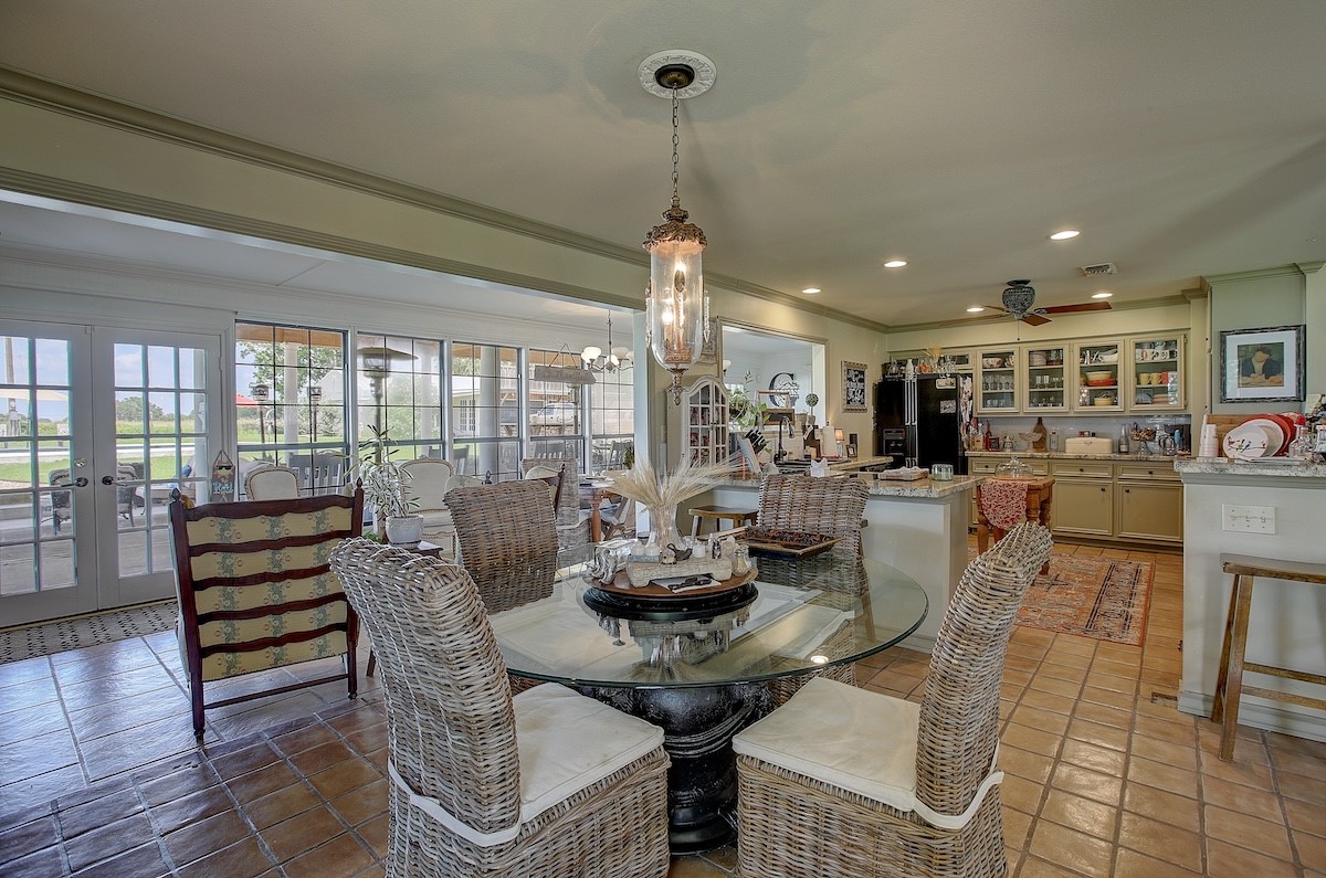 4214 Old College Road La Grange, TX 78945 - Photo 16 of 42 a living room with furniture a flat screen tv and a large window