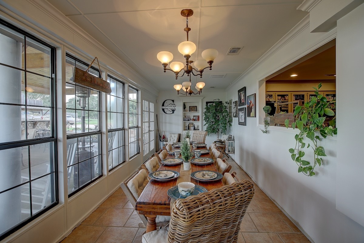 4214 Old College Road La Grange, TX 78945 - Photo 20 of 42 a view of a dining room with furniture window and wooden floor
