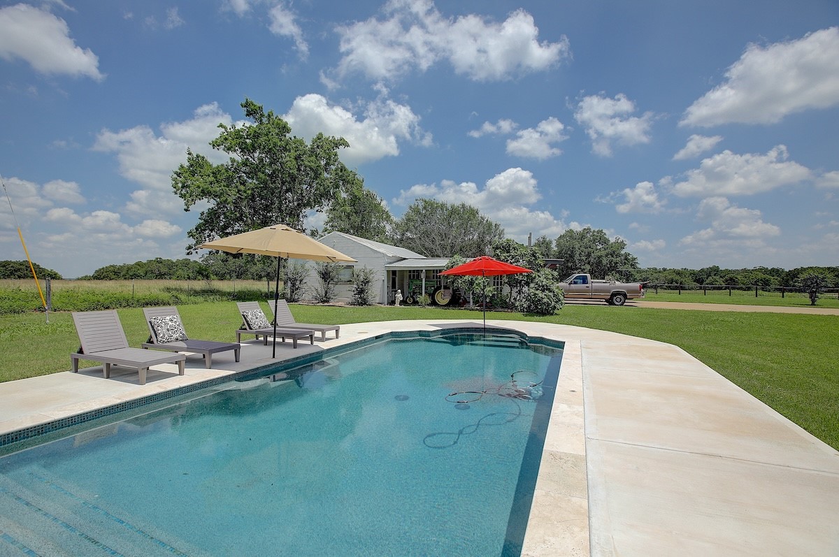 4214 Old College Road La Grange, TX 78945 - Photo 27 of 42 a view of swimming pool and lake view