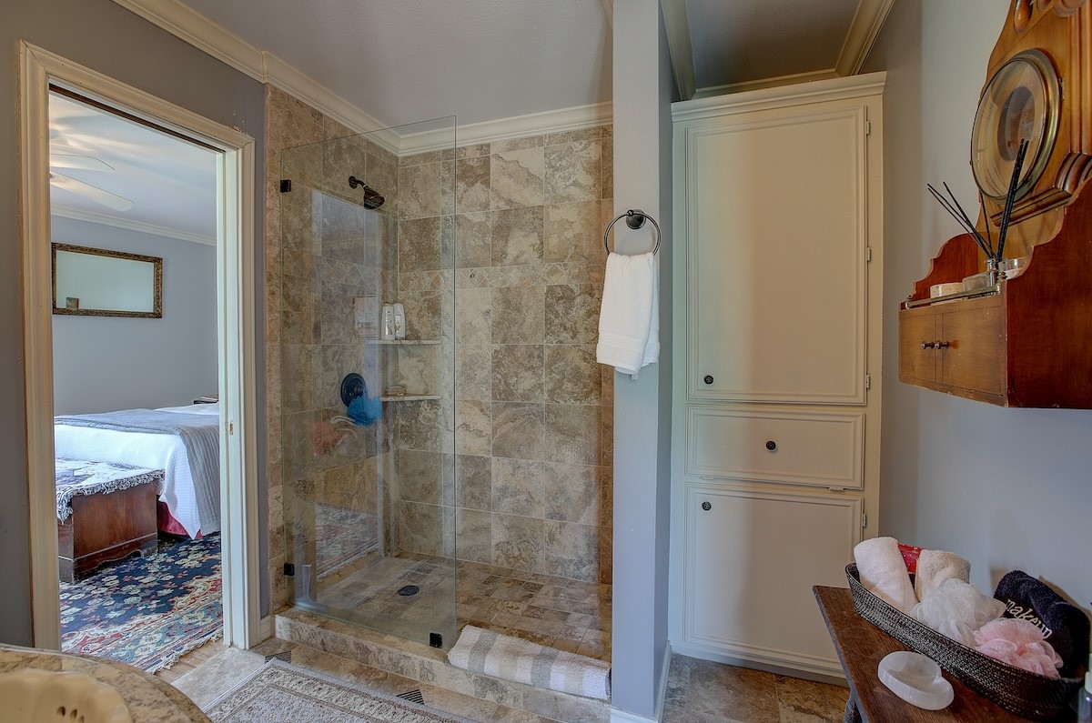 4214 Old College Road La Grange, TX 78945 - Photo 39 of 42 a bathroom with a shower and a sink