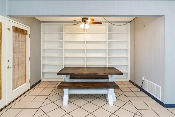 a view of a room with racks on the wall