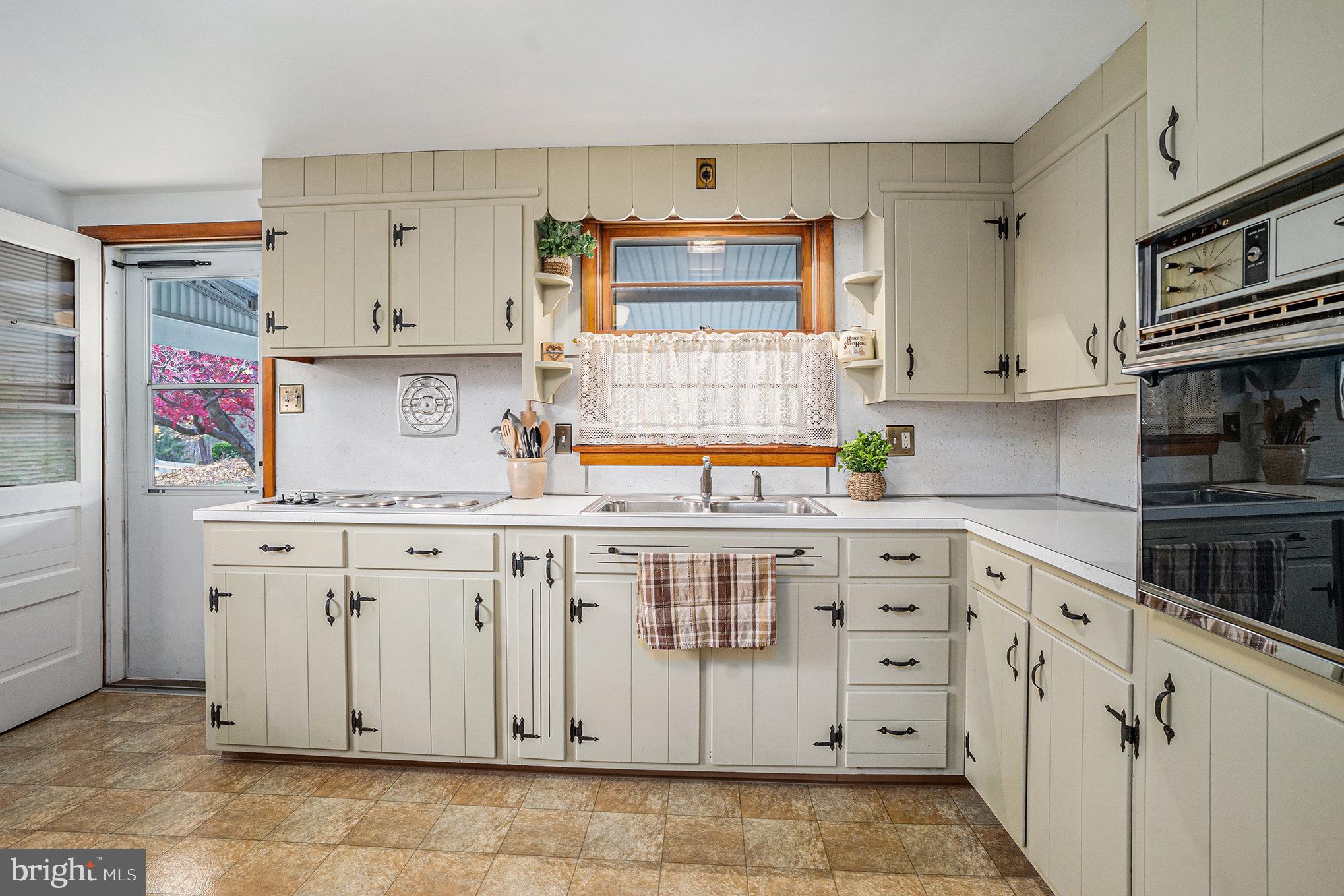 2390 Old Rte 100 Barto, PA 19504 - Photo 12 of 44 a kitchen with granite countertop a sink stainless steel appliances and cabinets