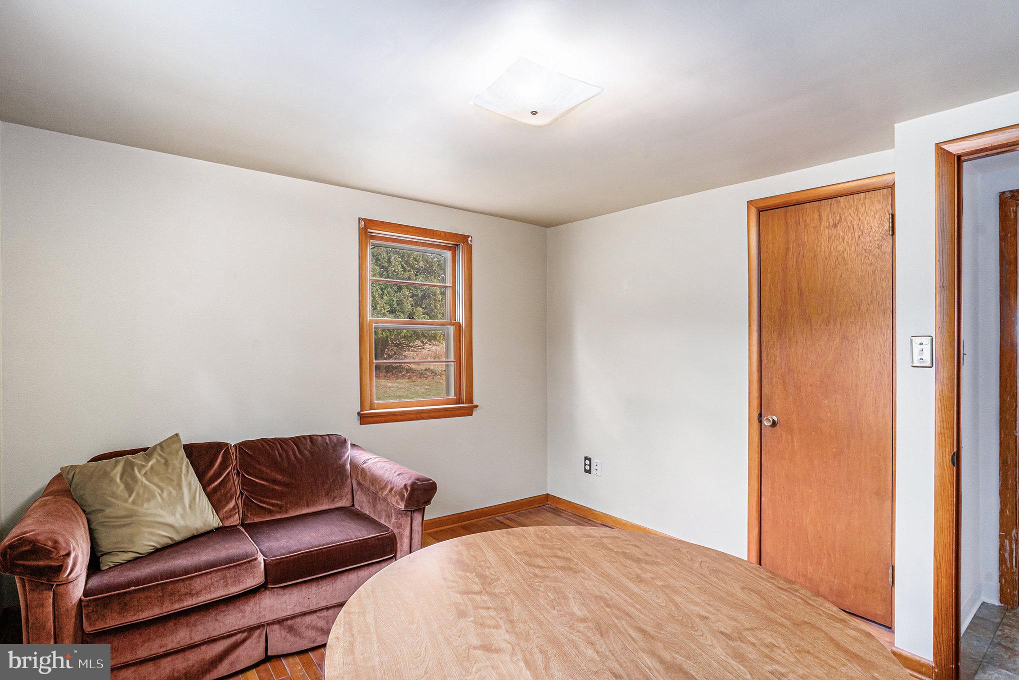 2390 Old Rte 100 Barto, PA 19504 - Photo 19 of 44 a bedroom with a bed and a couch