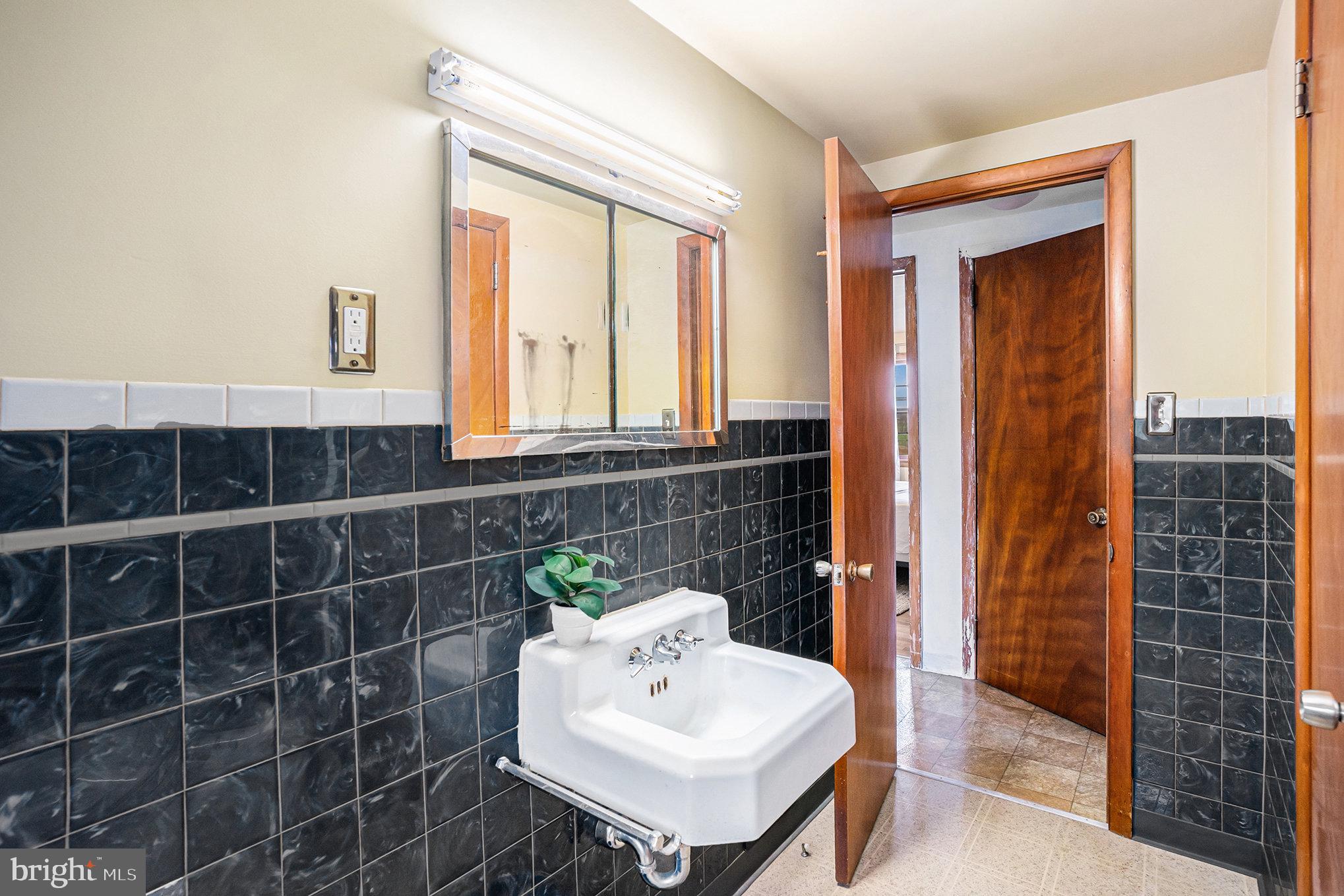 2390 Old Rte 100 Barto, PA 19504 - Photo 22 of 44 a bathroom with a sink a toilet and shower