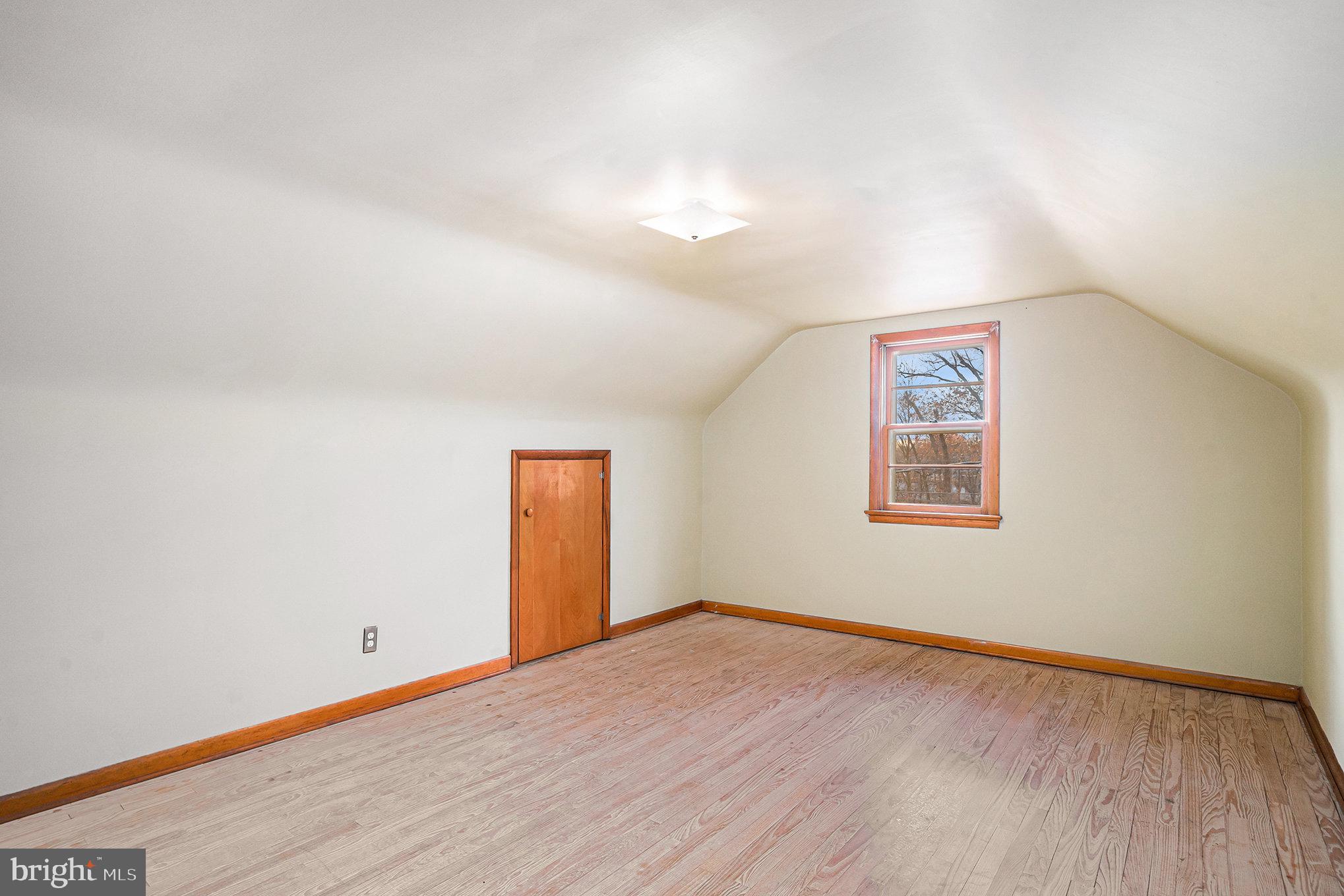 2390 Old Rte 100 Barto, PA 19504 - Photo 23 of 44 a view of an empty room with wooden floor and a window