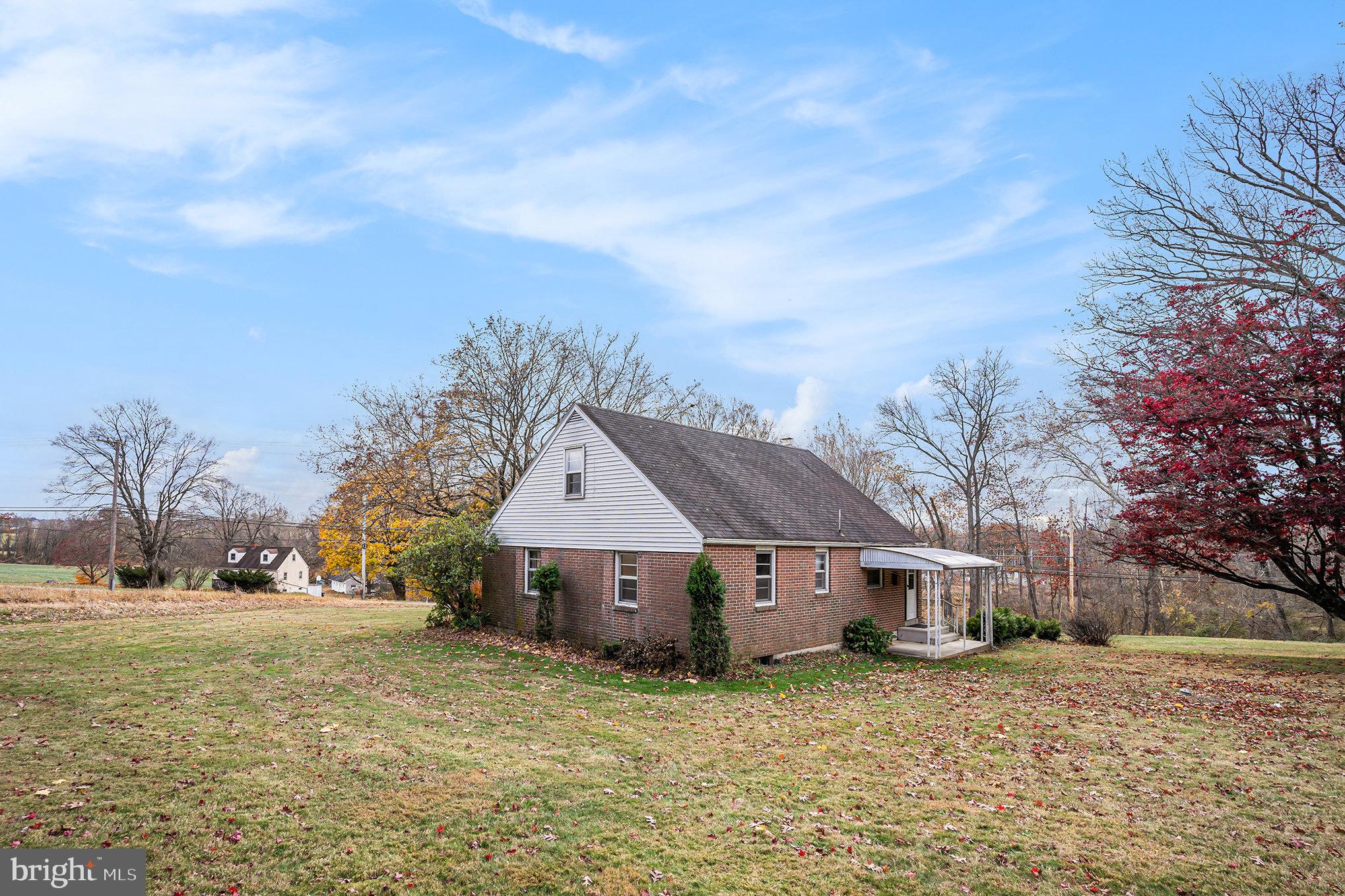 2390 Old Rte 100 Barto, PA 19504 - Photo 31 of 44 a front view of a house with a yard