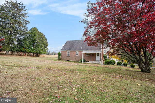 a house with trees in front of it