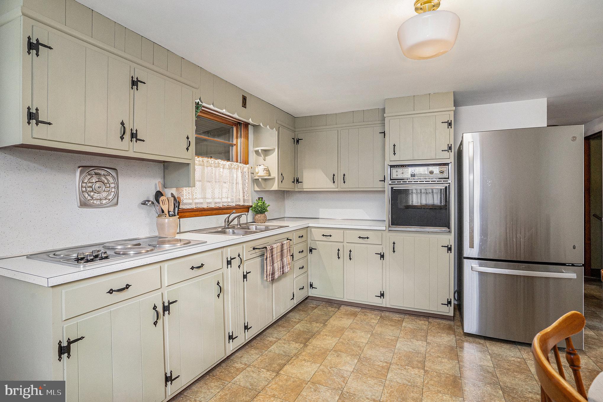 2390 Old Rte 100 Barto, PA 19504 - Photo 10 of 44 a kitchen with granite countertop cabinets and refrigerator