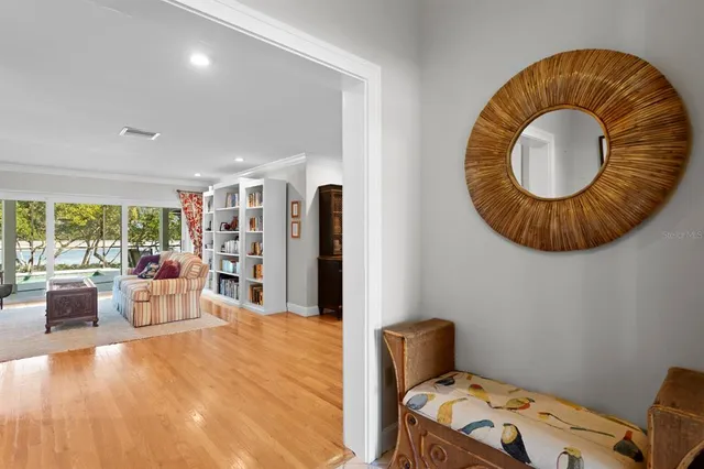 a kitchen with stainless steel appliances granite countertop a stove and a dining table