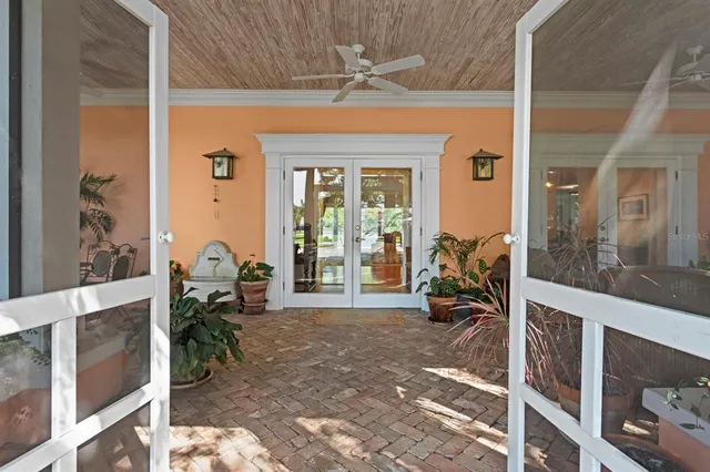 a bathroom with a double vanity sink mirror and toilet