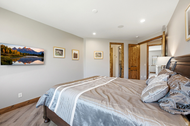 3148 Lower Saddleback Road Park City, UT 84098 - Photo 37 of 67 Bedroom featuring wood-finish flooring and light gray walls