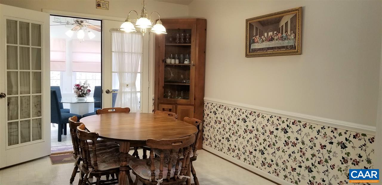 13 Colonial Road Palmyra, VA 22963 - Photo 12 of 34 a view of a dining room with furniture window and wooden floor