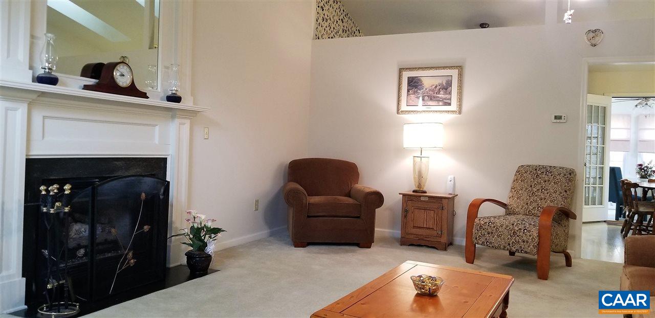 13 Colonial Road Palmyra, VA 22963 - Photo 2 of 34 a living room with furniture and a fireplace