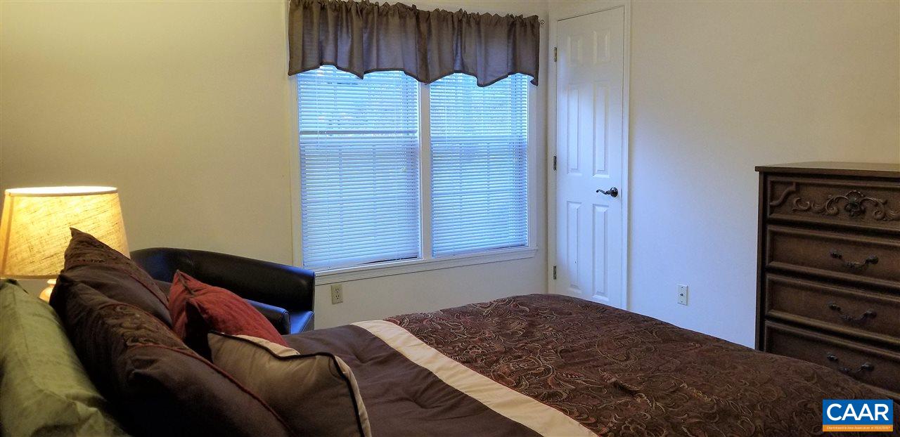13 Colonial Road Palmyra, VA 22963 - Photo 22 of 34 a bedroom with a bed and a closet