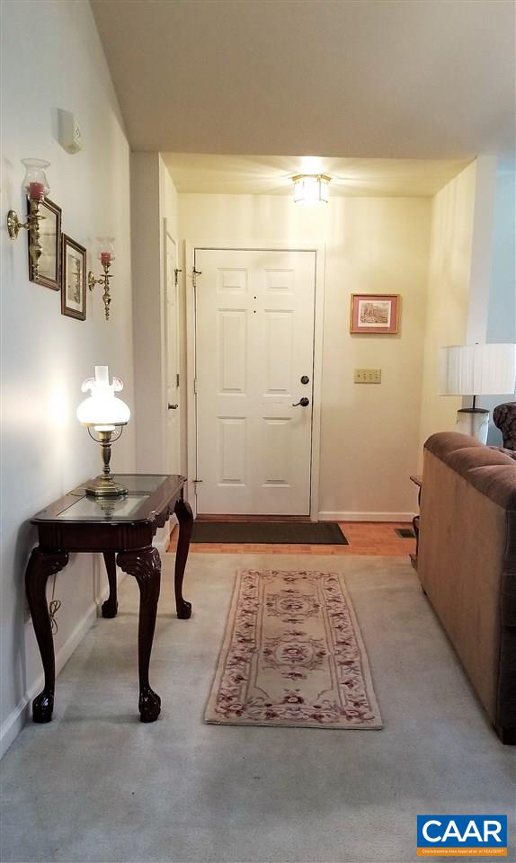 13 Colonial Road Palmyra, VA 22963 - Photo 8 of 34 a room with a table and a couch