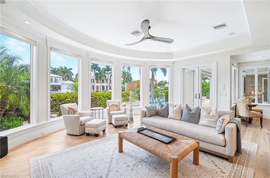 1888 6th Street South Naples, FL 34102 - Photo 5 of 37 a living room with furniture and a large window
