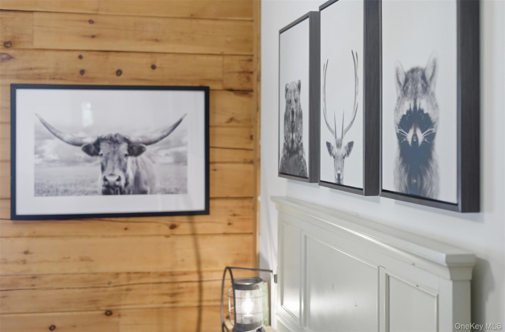301 Pucky Huddle Road Bethel, NY 12720 - Photo 24 of 39 The wildlife room, decorated with handsome animal prints, fitting the a cabin in the woods. This home gives all the right vibes.