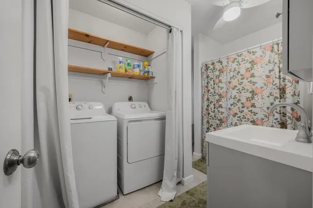 a utility room with dryer and washer