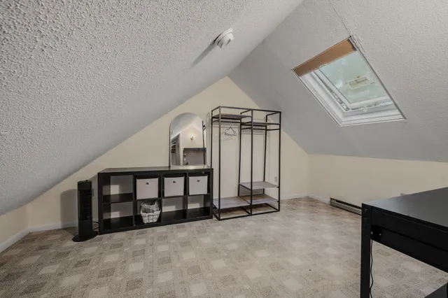 a room with furniture and a window