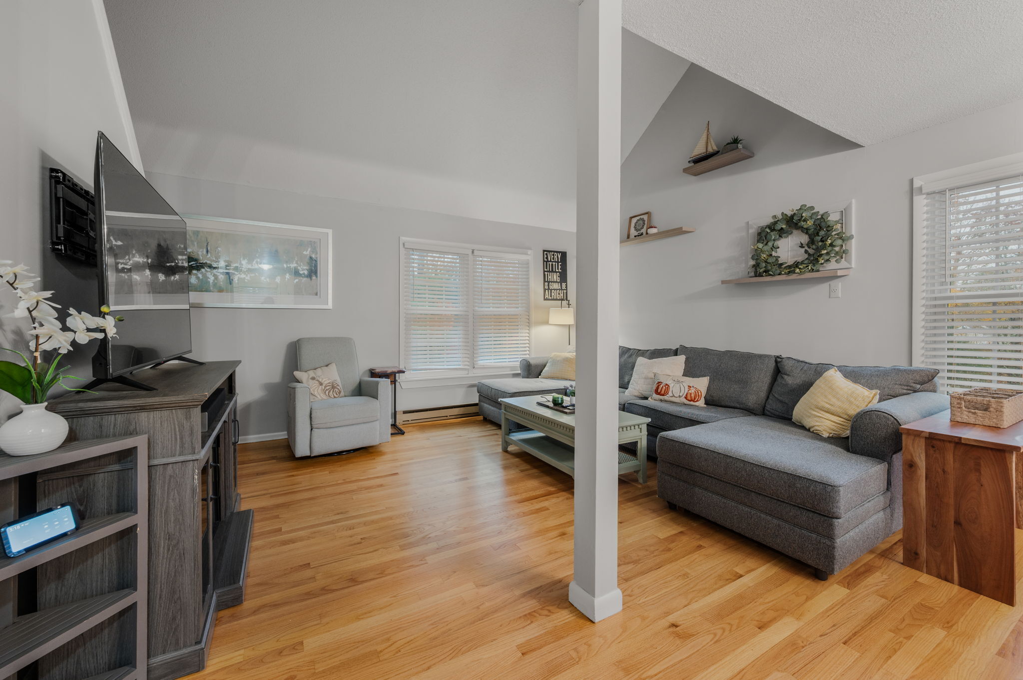 54 Rope Ferry Road, Unit C45 Waterford, CT 06385 - Photo 6 of 21 a living room with furniture and a wooden floor
