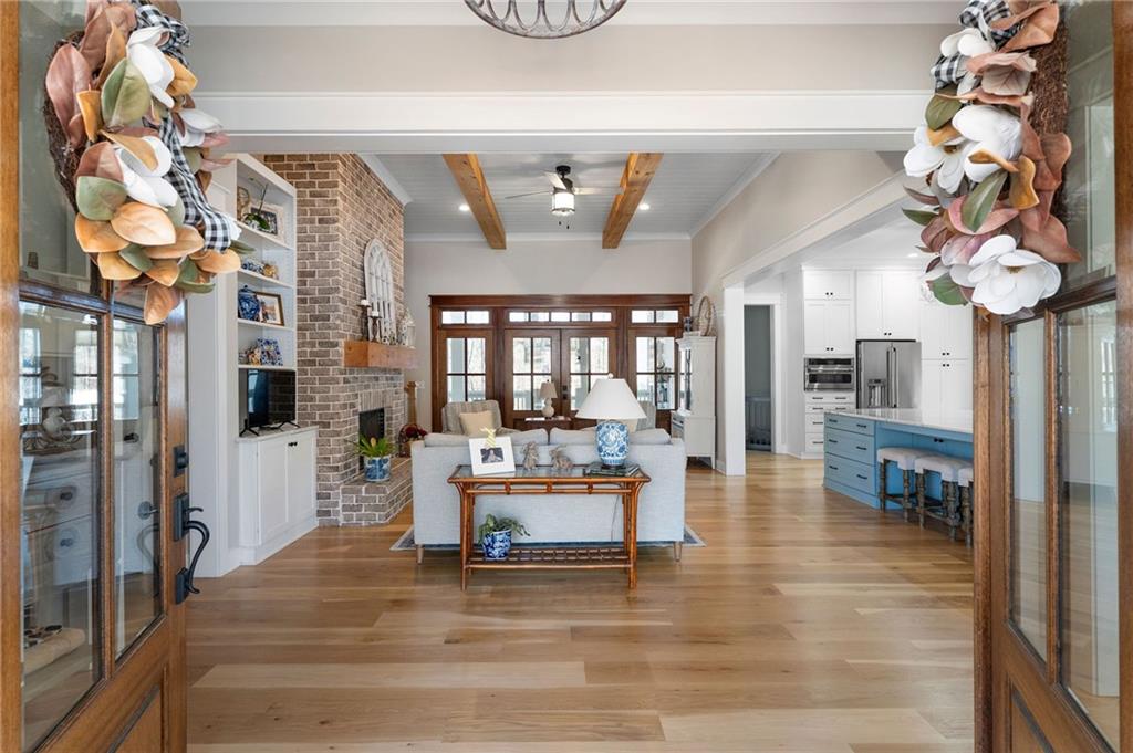 49 Cedar Gate Lane Kingston, GA 30145 - Photo 18 of 73 a living room with furniture and a chandelier