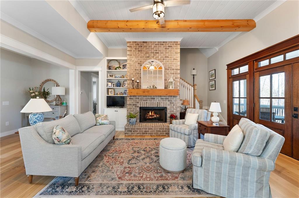 49 Cedar Gate Lane Kingston, GA 30145 - Photo 20 of 73 a living room with furniture a window and a fireplace