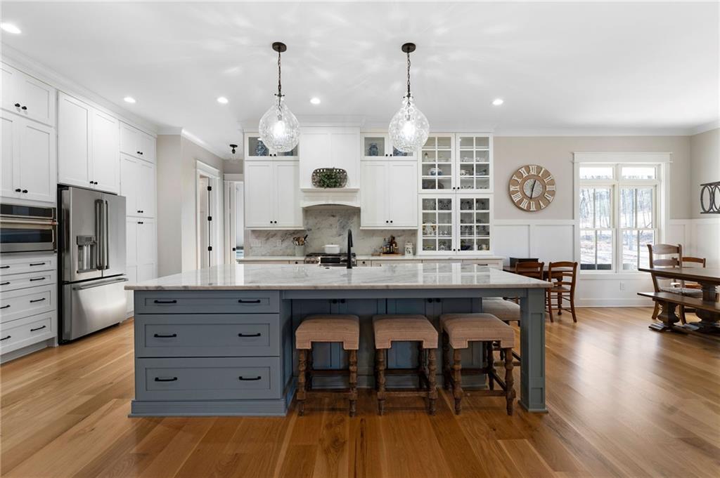 49 Cedar Gate Lane Kingston, GA 30145 - Photo 27 of 73 a kitchen with stainless steel appliances granite countertop a stove and a wooden floors