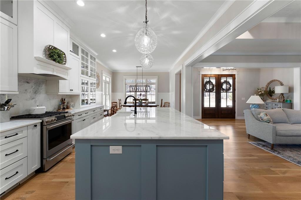 49 Cedar Gate Lane Kingston, GA 30145 - Photo 29 of 73 a kitchen with stainless steel appliances granite countertop a sink stove and refrigerator