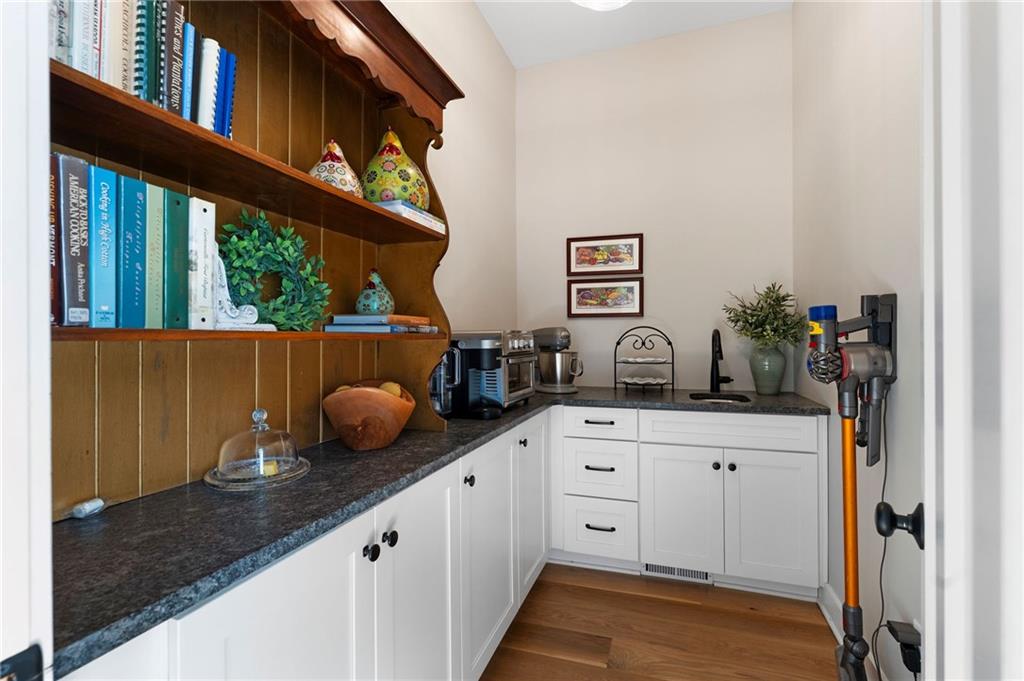 49 Cedar Gate Lane Kingston, GA 30145 - Photo 34 of 73 a kitchen with a sink and cabinets