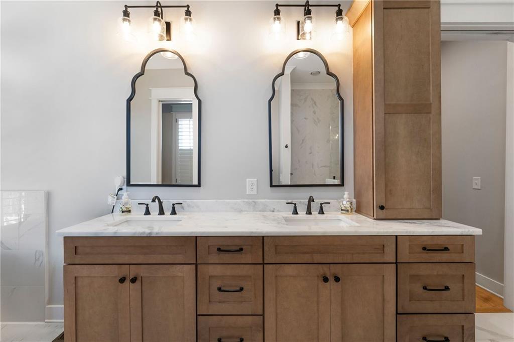 49 Cedar Gate Lane Kingston, GA 30145 - Photo 42 of 73 a bathroom with a double vanity sink and a mirror