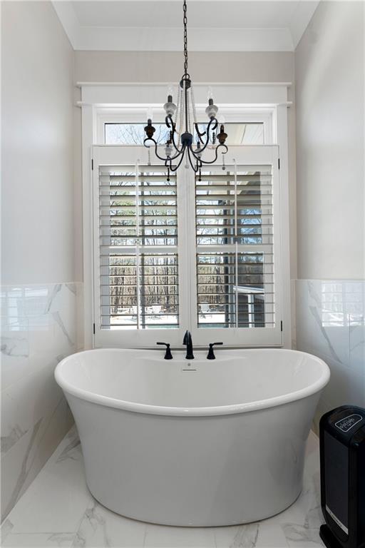 49 Cedar Gate Lane Kingston, GA 30145 - Photo 43 of 73 a white bath tub sitting in a bathroom next to a window
