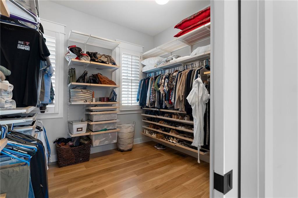 49 Cedar Gate Lane Kingston, GA 30145 - Photo 45 of 73 a view of walk in closet with clothes and shoes