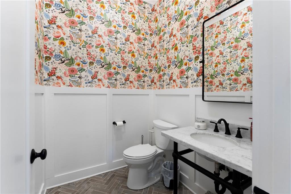 49 Cedar Gate Lane Kingston, GA 30145 - Photo 49 of 73 a bathroom with a toilet and a sink