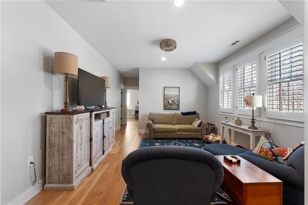 49 Cedar Gate Lane Kingston, GA 30145 - Photo 55 of 73 a living room with furniture a flat screen tv and a window