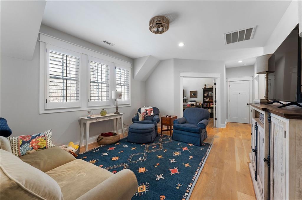 49 Cedar Gate Lane Kingston, GA 30145 - Photo 56 of 73 a living room with furniture and a flat screen tv