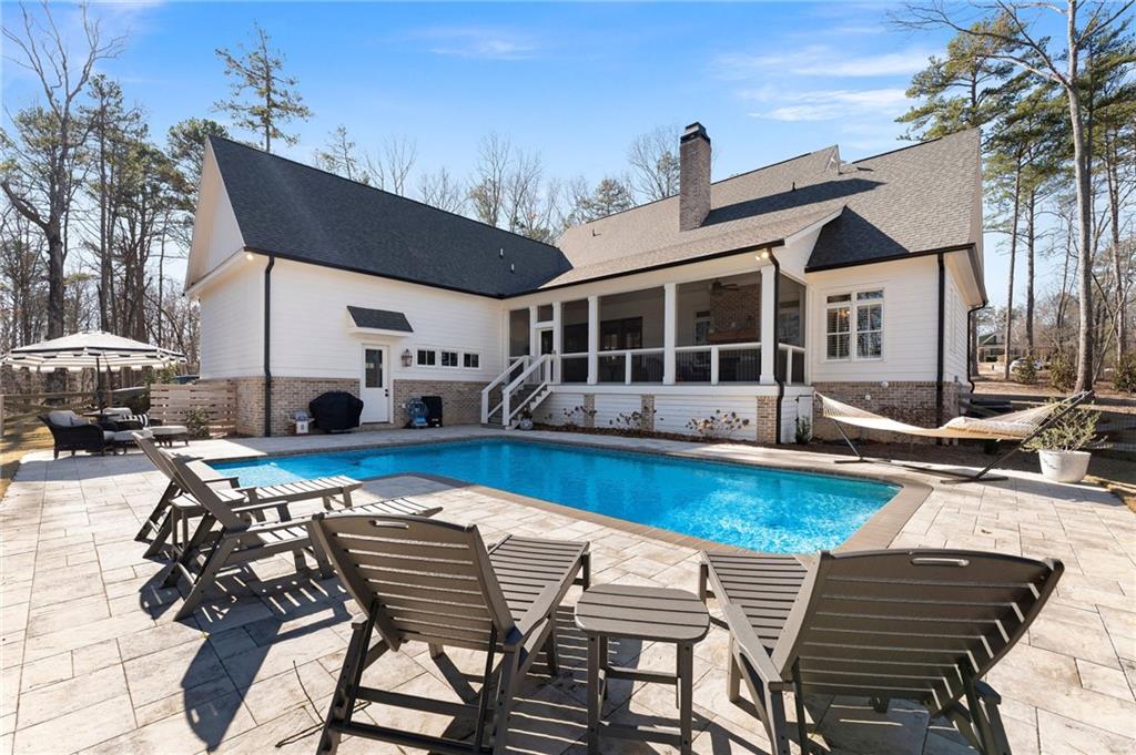 49 Cedar Gate Lane Kingston, GA 30145 - Photo 61 of 73 a view of a patio with furniture and a table