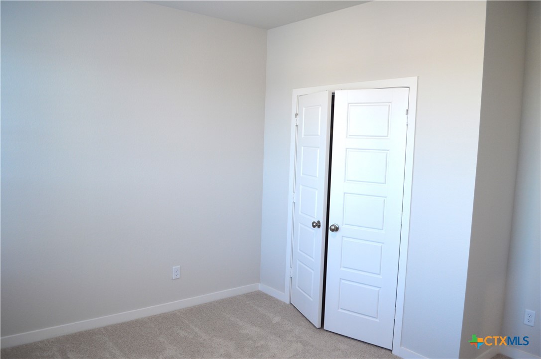 1911 Meridian Loop Temple, TX 76504 - Photo 22 of 26 an empty room with closet