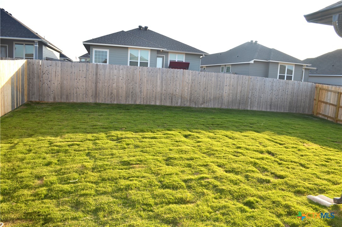 1911 Meridian Loop Temple, TX 76504 - Photo 23 of 26 a view of a house with a yard