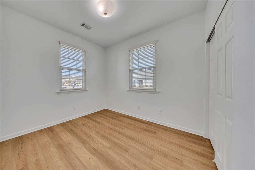 3972 Cutler Donahoe Way Cumming, GA 30040 - Photo 22 of 46 an empty room with windows