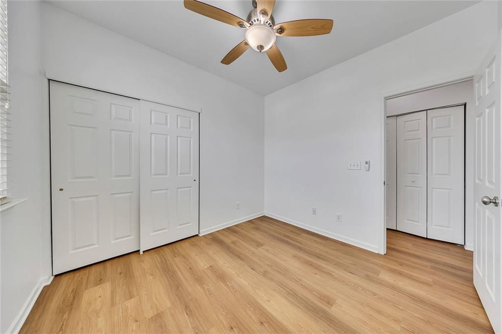 3972 Cutler Donahoe Way Cumming, GA 30040 - Photo 25 of 46 a view of empty room with wooden floor