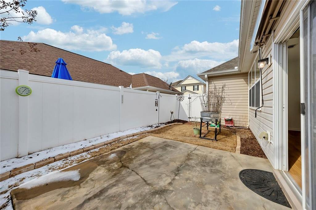 3972 Cutler Donahoe Way Cumming, GA 30040 - Photo 33 of 46 a view of a backyard with patio