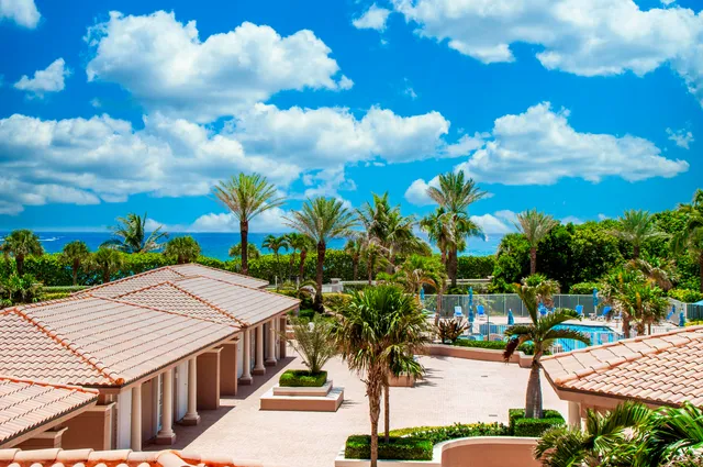 a view of an outdoor space with yard and sitting area