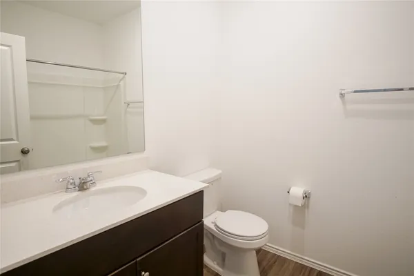 a bathroom with a sink and a toilet