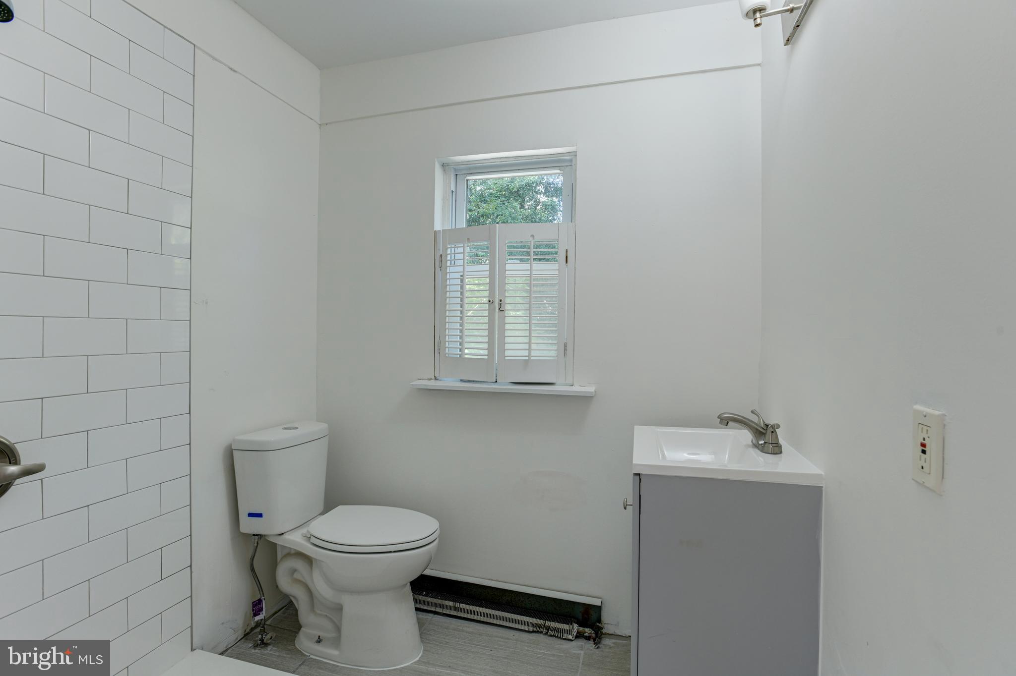 7018 Kenleigh Road Baltimore, MD 21212 - Photo 21 of 42 new full bath main level. shower doors on order