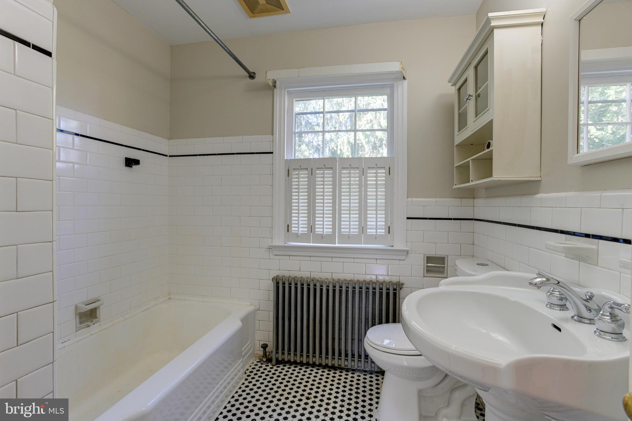 7018 Kenleigh Road Baltimore, MD 21212 - Photo 31 of 42 full bath has some renovations