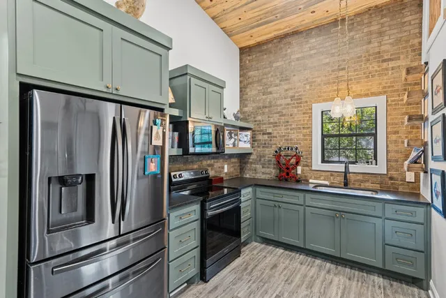 a view of a garage with a bike and car
