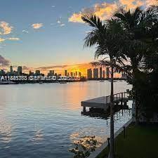 93 Palm Avenue Miami Beach, FL 33139 - Photo 11 of 12 a view of a lake from a yard