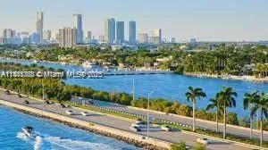 a view of a lake from a yard