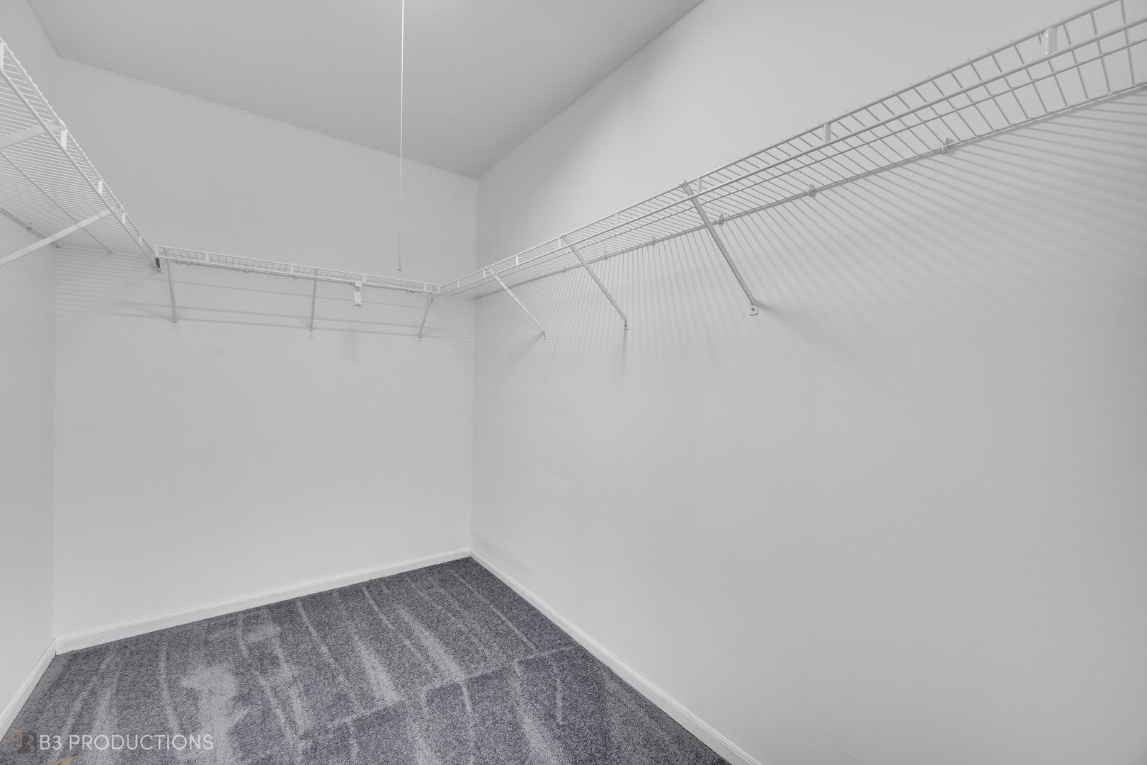 1722 Red Bud Road Bolingbrook, IL 60490 - Photo 16 of 29 a view of a room with racks on the wall