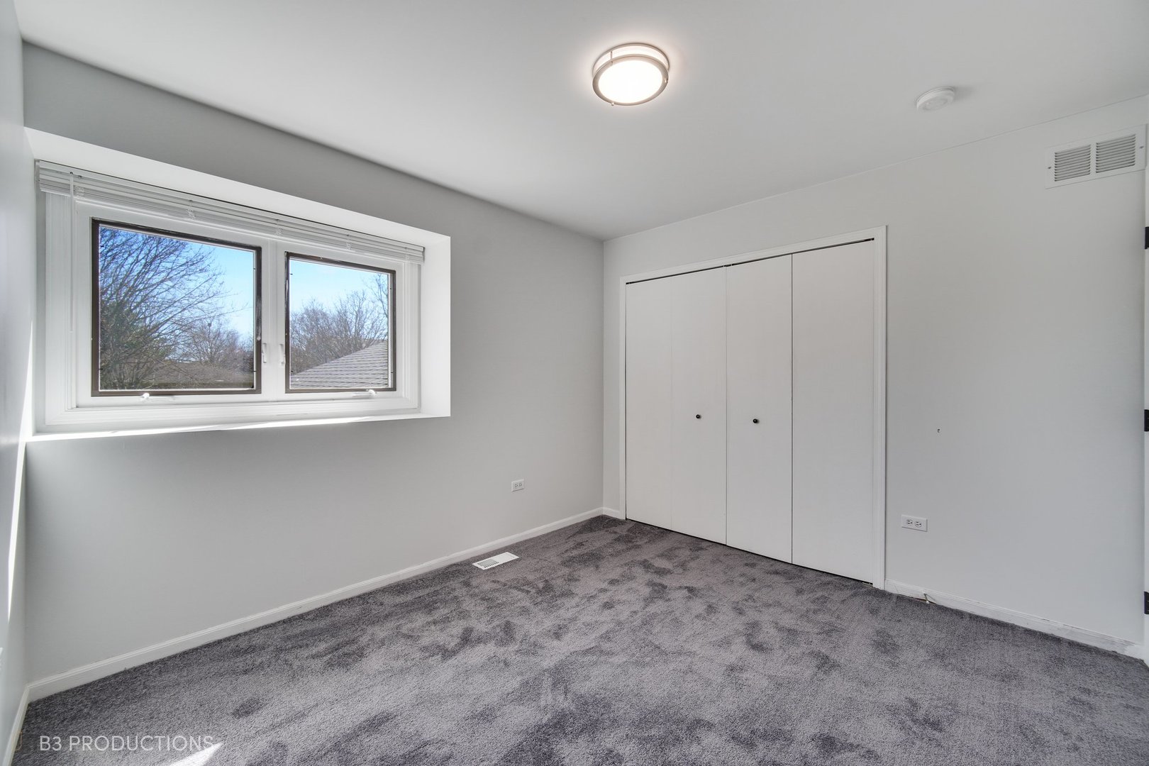 1722 Red Bud Road Bolingbrook, IL 60490 - Photo 20 of 29 a view of an empty room with a window